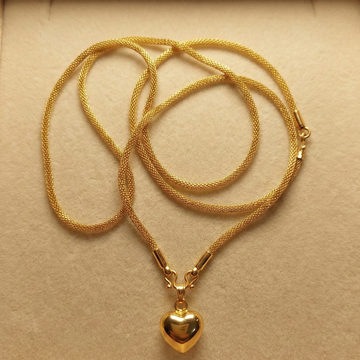 Gold necklace with a heart pendant in a beige box